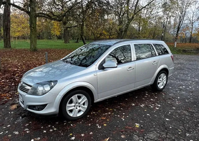 poznań Opel Astra cena 11900 przebieg: 297000, rok produkcji 2012 z Poznań